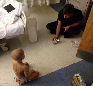 Child playing with gift